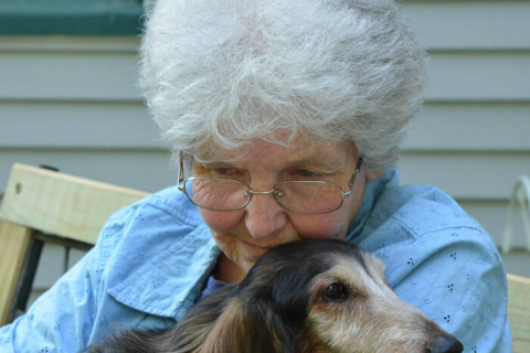 Emily ward holding a dog