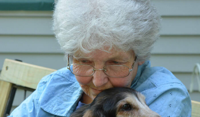 Emily ward holding a dog