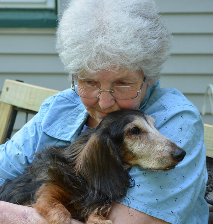 Emily ward holding a dog