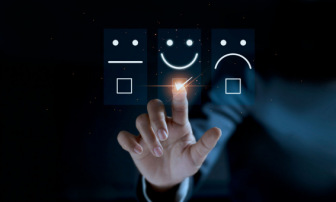 Man choosing smiley face