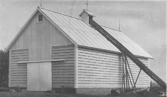 Vintage farmers corn crib made with asbestos materials