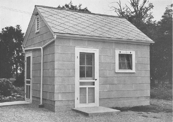 Vintage photo of a farmers' milk house built with asbestos