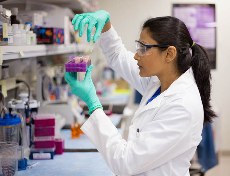 Female researcher in a lab Female researcher in a lab
