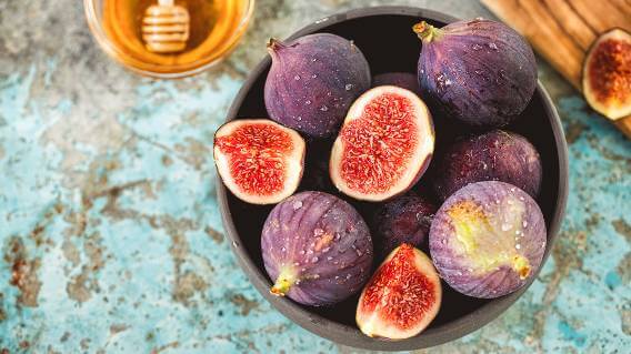 Figs in bowl with honey