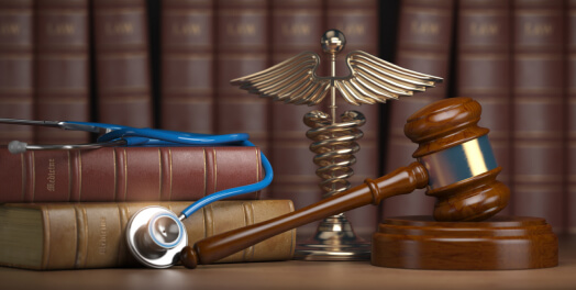 Books, justice symbol and gavel