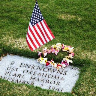 Flag at Pearl Harbor grave marker