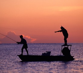 Two Friends Fishing at Sunset