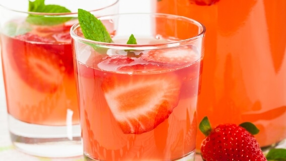 Pink drink with mint and strawberries