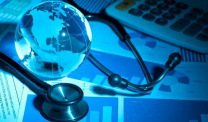 Globe and stethoscope on charts