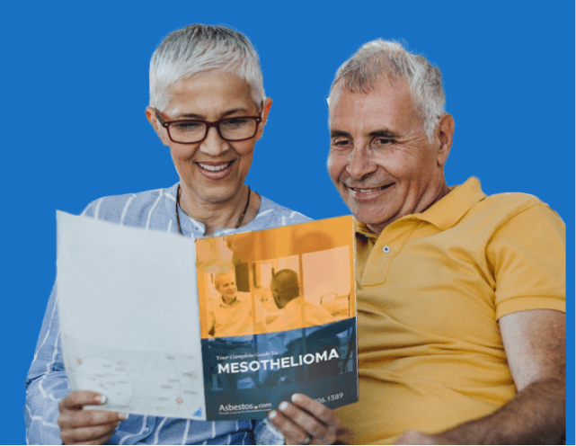 Elderly couple reading The Mesothelioma Guide together