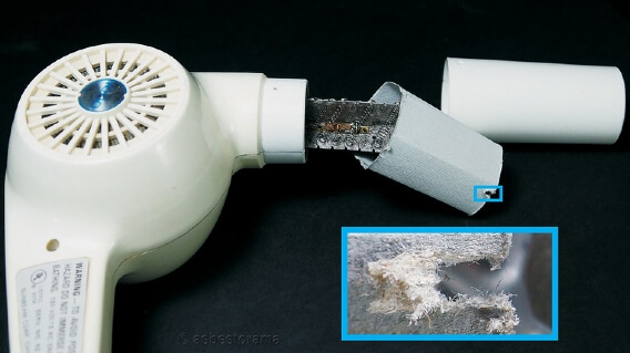 Asbestos paper insulation inside a hair dryer handle