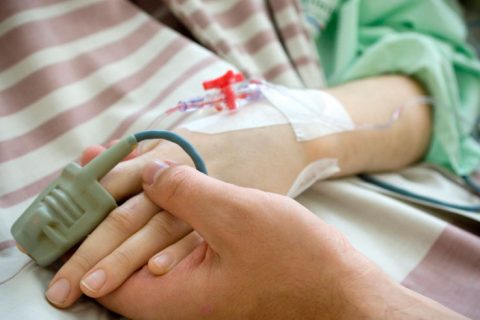 Patient's hands during treatment