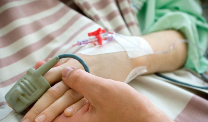 Patient's hands during treatment