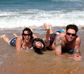 Mesothelioma Survivor Heather H. on beach with husband, Curt, and daughter, Stori