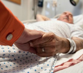 Holding a Patient's Hand