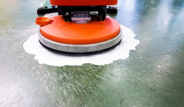 Cleaning floor with buffing machine
