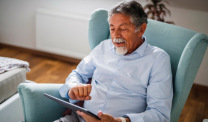 A mesothelioma survivor participates in the online support group