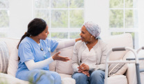 Mesothelioma patient with hospice care team member