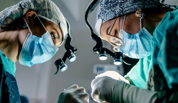 Specialists performing mesothelioma surgery