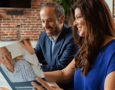 Missy Miller and Jose Ortiz reading resources provided by The Mesothelioma Center