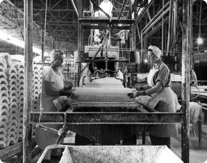 two johns-manville factory workers handling friable asbestos