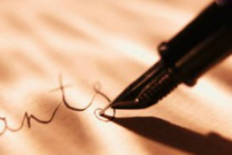 Pen Writing on Paper