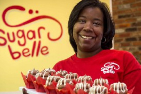 Peritoneal mesothelioma survivor Kasie Coleman in her Sugarbelle bakery