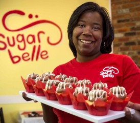 Peritoneal mesothelioma survivor Kasie Coleman in her Sugarbelle bakery