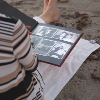 Lorraine Kember with photo album