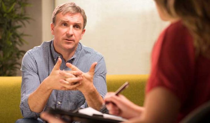 Man in a counseling session