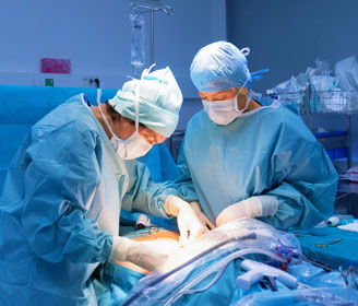 Surgeons performing on a mesothelioma patient.