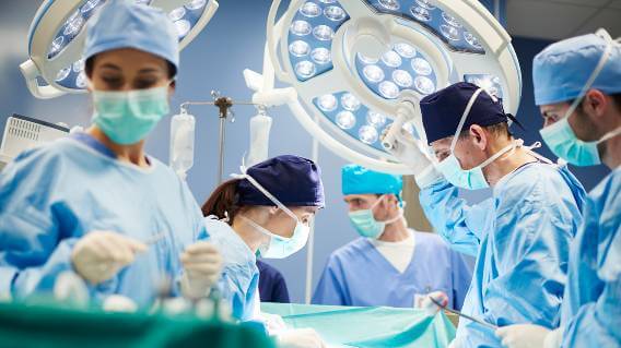 Surgeons in operating room