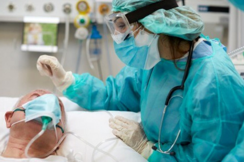 Patient and doctor prepping for surgery
