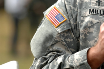 Military fatigues with American flag