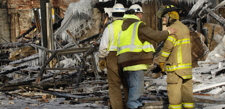 First responders evaluating damage following a natural disaster.