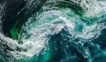 Swirling ocean water with whitecaps