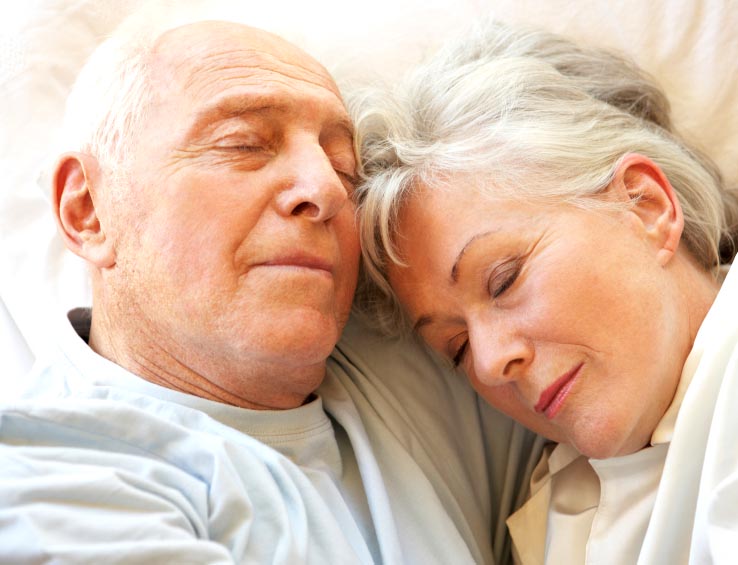 Senior Couple Sleeping In Bed Senior Couple Sleeping In Bed