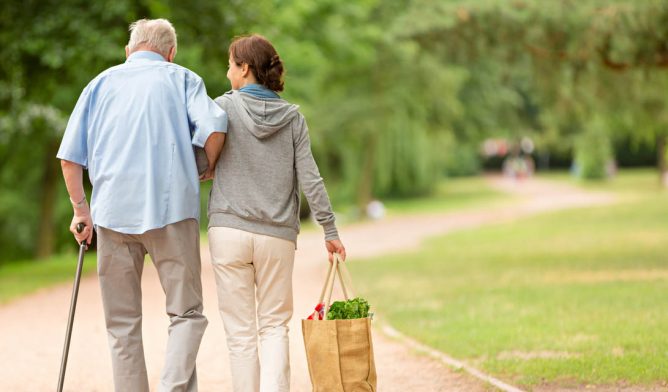 Caregiver helping patient