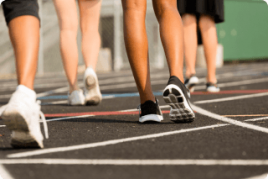 group of people running on track