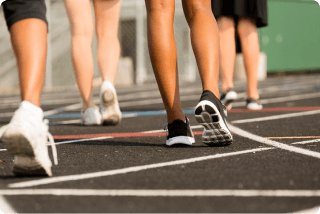 group of people running on track