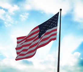 U.S. flag waving in the sky