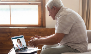 Older man on video call