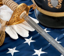 Military Sword, Hat & Glove on Flag