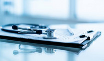 Stethoscope on medical paperwork