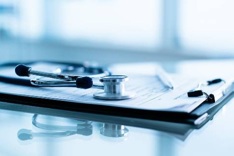 Stethoscope on medical paperwork