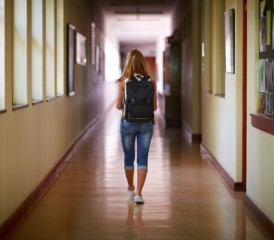 Student Walking Down Hallway