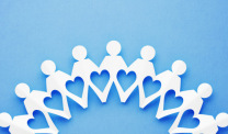 Paper chain of people on blue background