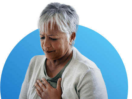 Women holding her chest, dealing with body pain, fatigue and other cancer symptoms