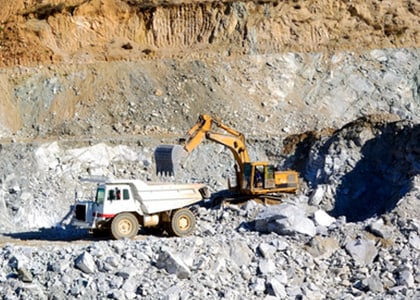 Truck and tractor at a talc mine