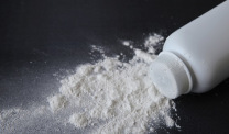 Talcum powder on black background